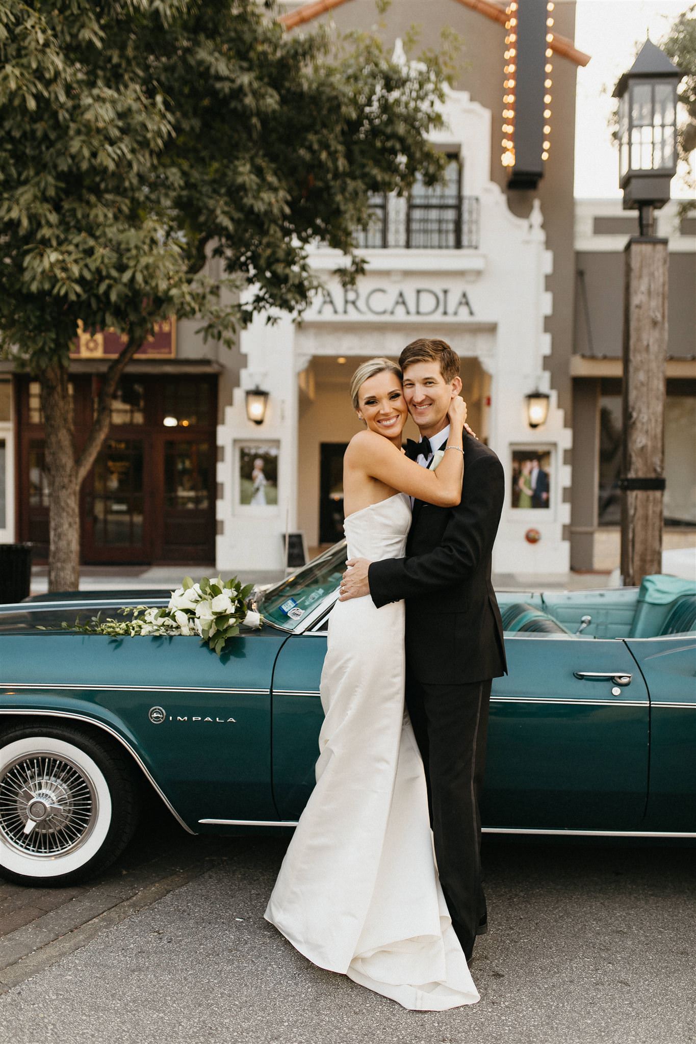 bride and groom posing with clasic car kerrville photographer leah thomason